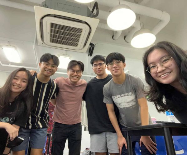 Mr Nicholas Lim and his students