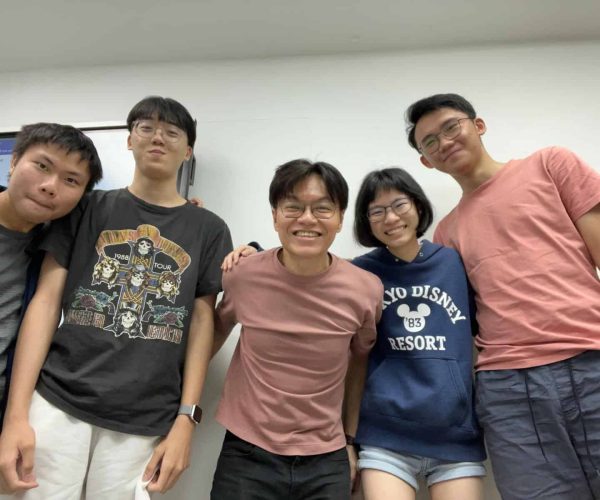 Mr Nicholas Lim and his students