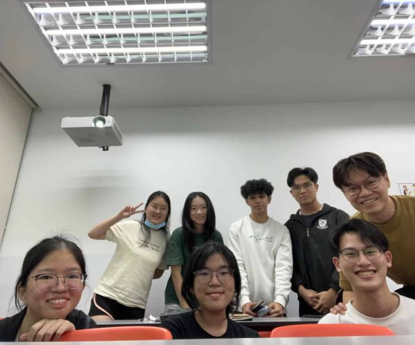 Mr Nicholas Lim and his students